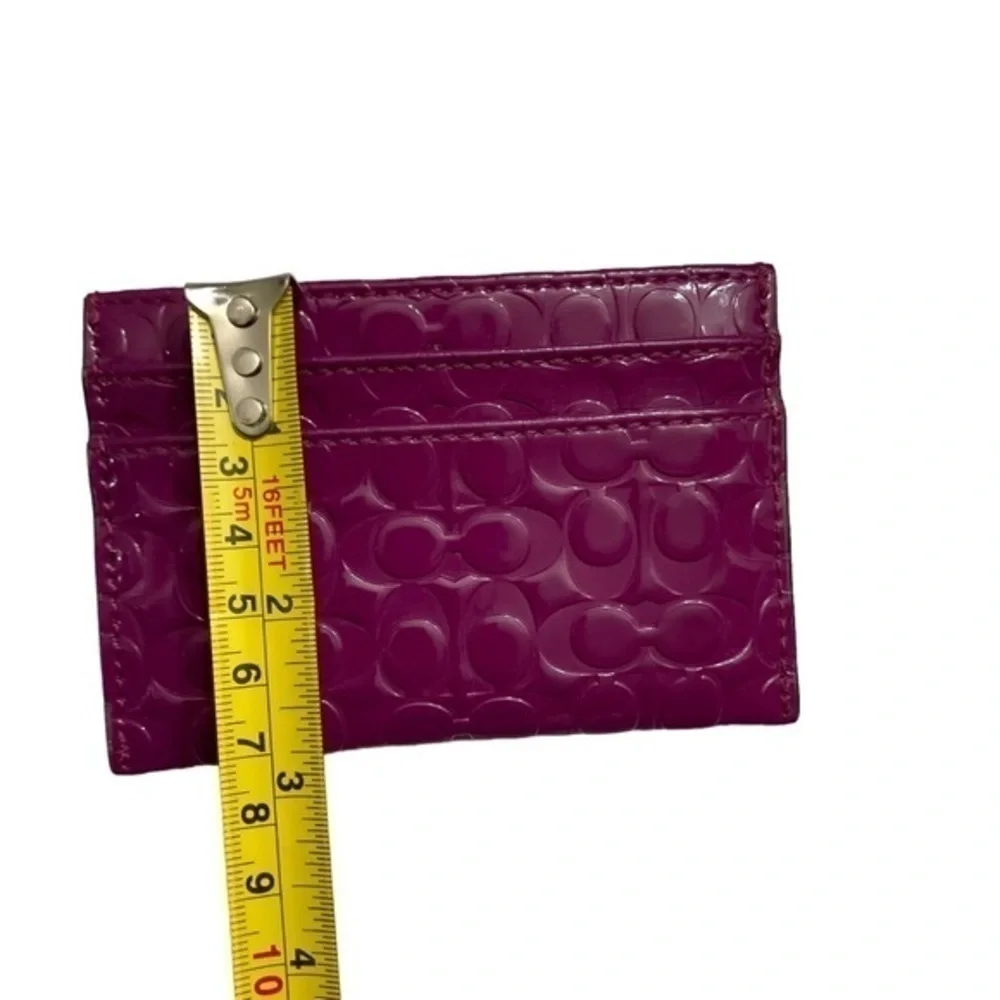 Coach purple patent leather embossed signature c card holder